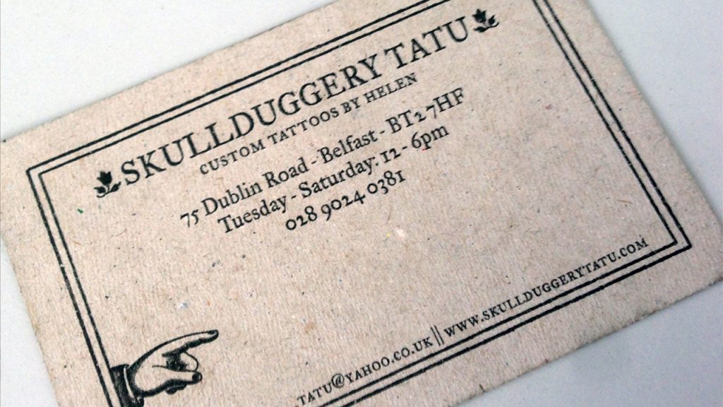 Skullduggery Tatu Business Card Design - litho printed on a reclaimed board in black ink
